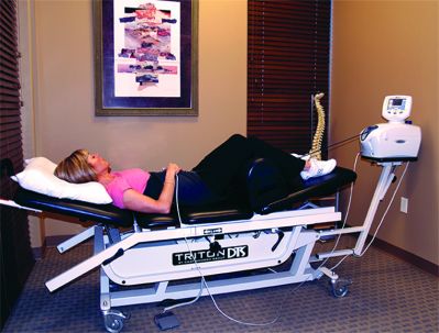 Woman receiving spinal decompression in Scottsdale